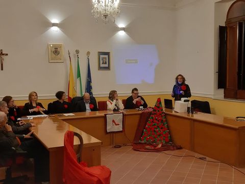 Convegno sulla violenza contro le donne — opera “No Violence”